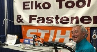 Man Smiling In Front of Elko Tool & Fastener Booth